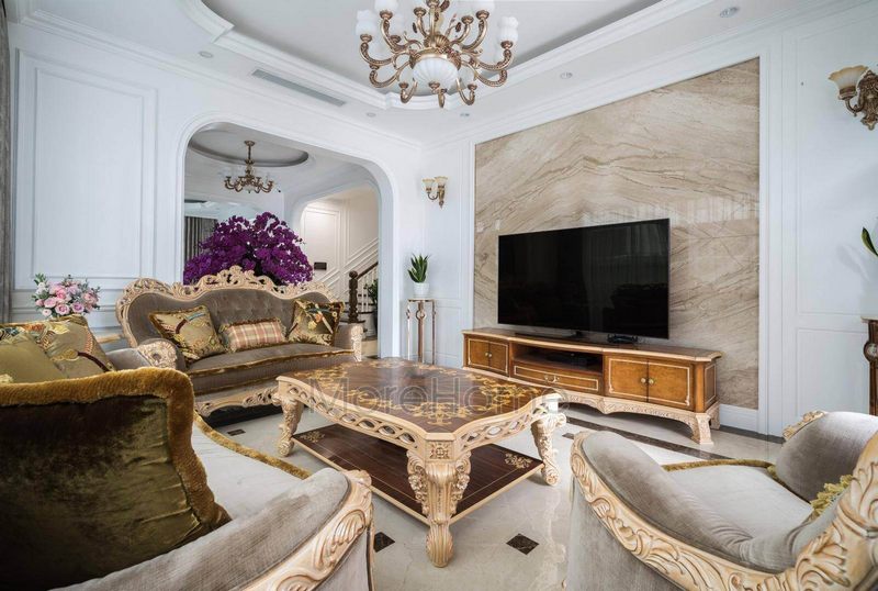 Bộ bàn ghế sofa nệm bọc nỉ khung gỗ màu nâu với thiết kế tập trung vào từng chi tiết phong thủy Á - Đông Âu hài hòa